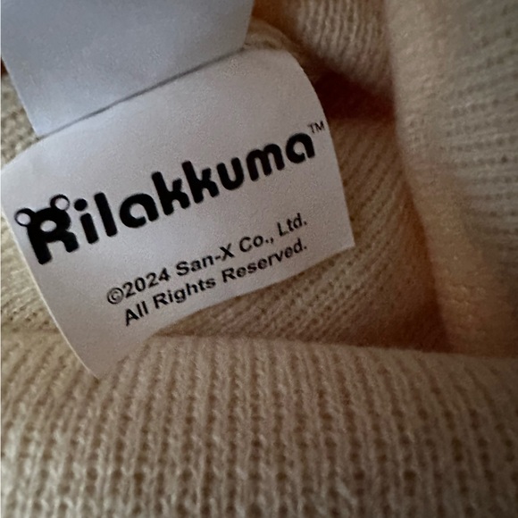 RILAKKUMA SAN-X CO BEIGE BEANIE OS NWT PATCH IS SEWN ON UNISEX - Picture 8 of 8